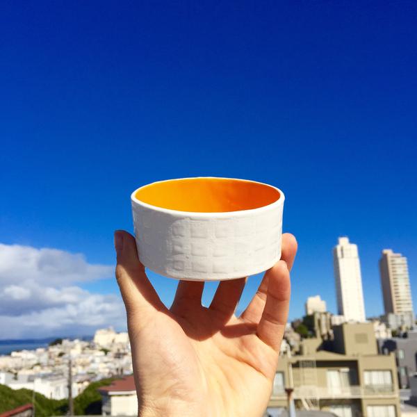 Short White Grid Planter with Orange Center
