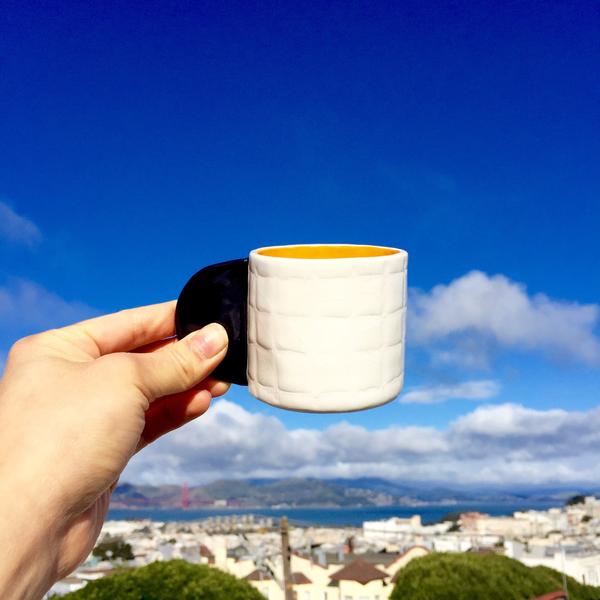 Small White Grid Cup with Orange Center